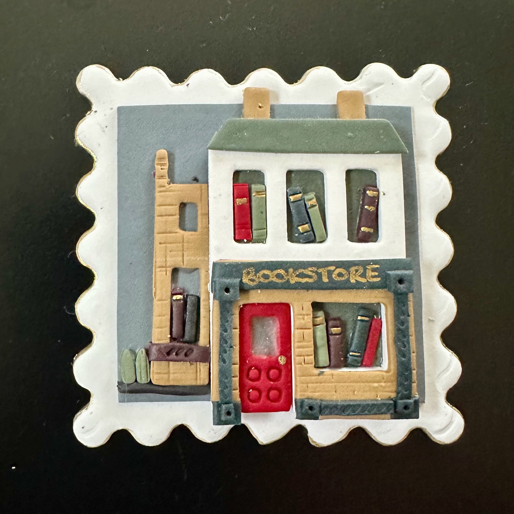 Decorative magnet of a bookstore with books on a black background. Available as wall art, magnet or brooch.
